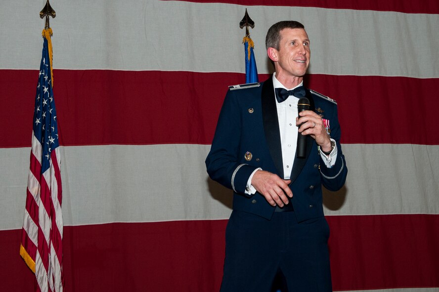 U.S. Air Force Col. Thomas Kunkel, 23d Wing commander, speaks during the 2015 Annual Awards Ceremony, Feb. 4, 2016, at Moody Air Force Base, Ga. Kunkel praised the efforts of all nominees, congratulated each of them for a job well done and encouraged all Airmen to strive to wear a medallion every year. (U.S. Air Force photo by Airman 1st Class Lauren M. Johnson/Released)