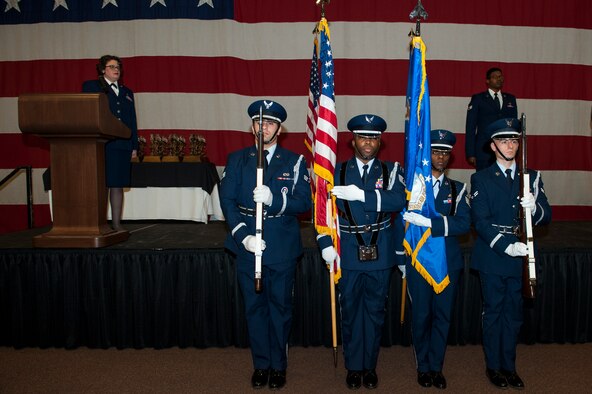 The Moody Air Force Base Honor Guard presents the colors during the 2015 Annual Awards Ceremony, Feb. 4, 2016, at Moody Air Force Base, Ga. During the ceremony, Senior Airman Aaron Blaylock, 41st Rescue Squadron aircrew flight equipment technician, sang the national anthem. (U.S. Air Force photo by Airman 1st Class Lauren M. Johnson/Released)