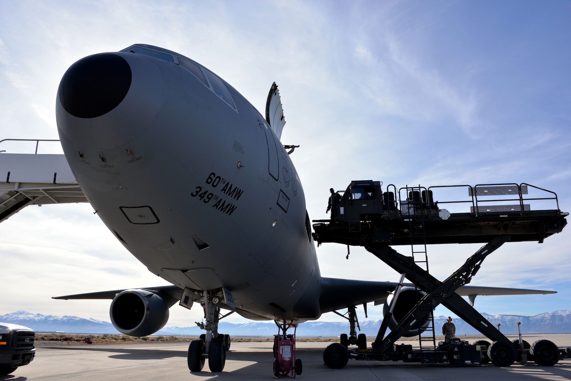 Airmen from the 821st Contingency Response Group offload cargo from a KC-10 Extender Jan. 21 during a unit exercise at Amedee Army Airfield, Calif. (U.S. Air Force photo by Staff Sgt. Charles Rivezzo) 
