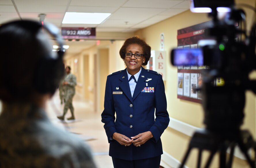Col. Vanessa Mattox, 932nd Medical Group commander, does an on-camera interview with a member of the 375th Air Mobility Wing public affairs office Jan. 11, 2016, Scott Air Force Base, Illinois.  Mattox spoke about the newly renovated Aerospace Medicine Squadron's clinic and the importance of such a space.  We are now able to work in a very organized environment. We have nice treatment rooms. There are areas for training, and we have areas where physicians and other providers are able to do their documentation in a quiet setting, Mattox said.  (U.S. Air Force photo by Christopher Parr)