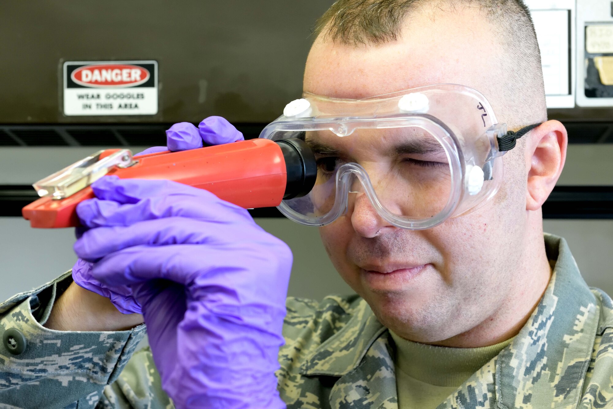 Senior Airman John Ortiz-Morales, 403rd Logistics Readiness Squadron fuels quality control specialist, uses a refractometer to measure the amount of fuel system icing inhibitor in a sample of Jet A fuel Jan.y 9, 2016, at Keesler Air Force Base, Mississippi. Fuels quality control specialists are responsible for making sure the fuel used by U.S. Air Force aircraft is fit for flight. (U.S. Air Force photo/Tech. Sgt. Ryan Labadens)