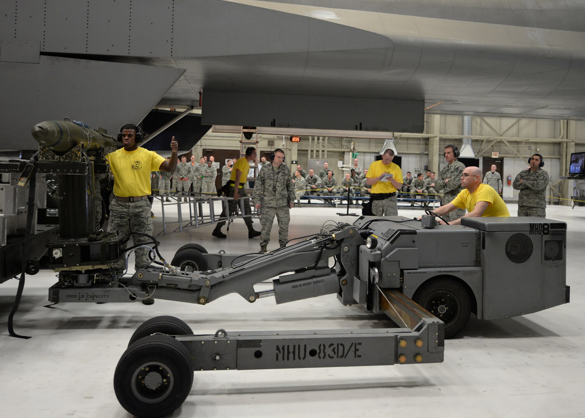 Airmen of the 28th Aircraft Maintenance Squadron participate in a load crew of the quarter competition at Ellsworth Air Force Base, S.D., Jan. 29, 2016. The 34th and 37th Aircraft Maintenance Units displayed their skills during a 25-minute loading challenge, which included a quiz, tool box setup evaluation and uniform inspections. The victors this quarter were the Airmen from the 37th AMU. (U.S. Air Force photo by Airman Sadie Colbert/Released)