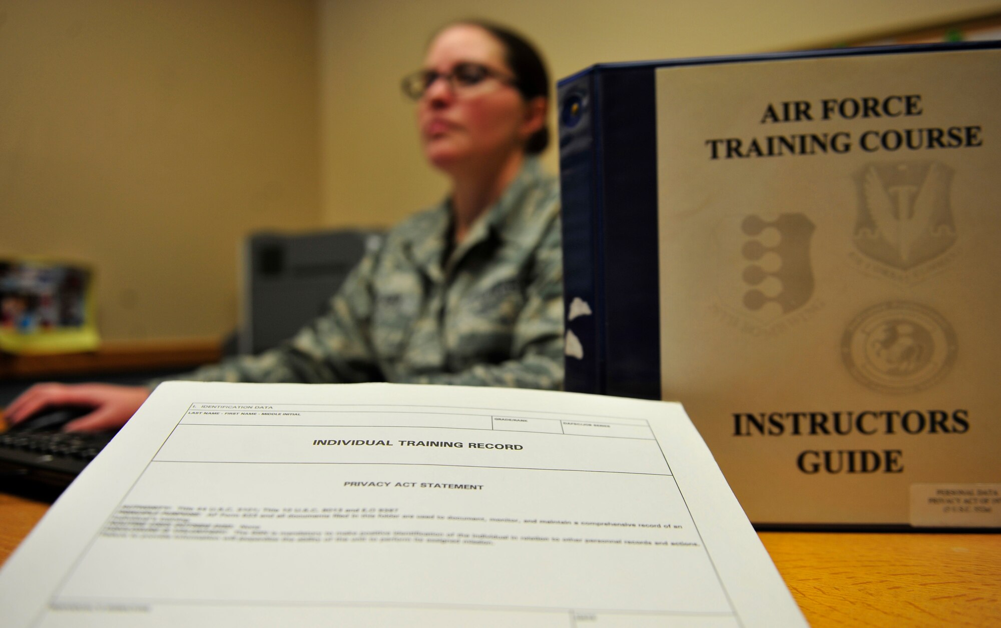 Tech. Sgt. Naomi Palmer, 28th Bomb Wing base training manager, logs training records at Ellsworth Air Force Base, S.D., Feb. 1, 2016. As base training manager Palmer keeps track of more than 600 Airmen on base who are in upgrade training. (U.S. Air Force photo by Airman 1st Class James L. Miller/Released)