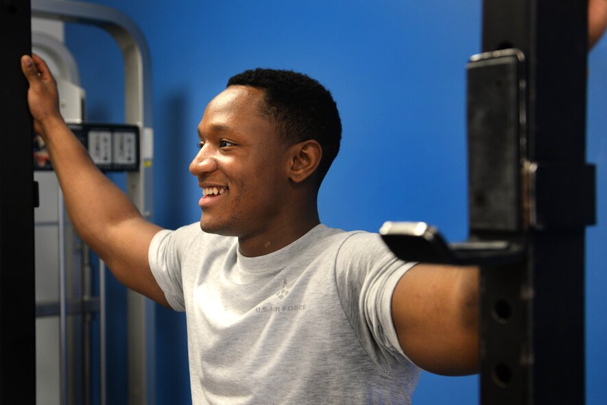 Senior Airman Adamma Bilal, a response force member assigned to the 91st Missile Security Forces Squadron from Minot Air Force Base, N.D., takes a break during the quarterly Top Dog competition Jan. 27, 2016 at the McAdoo Fitness Center. Bilal was one of seven members of his flight to compete in the competition, which consisted of various strength and endurance exercises. (U.S. Air Force photo/Airman 1st Class Jessica Weissman) 