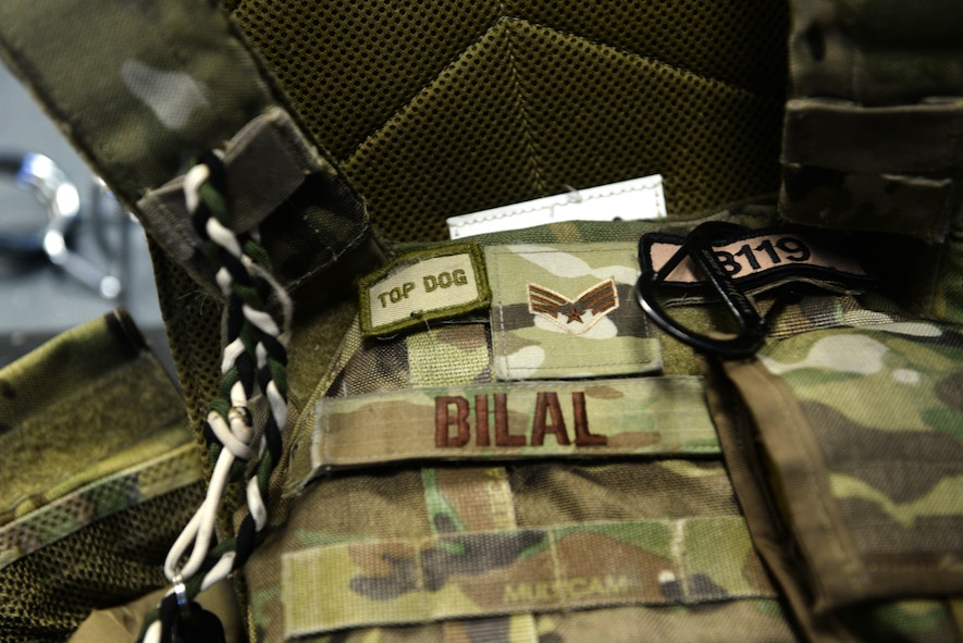 The tactical vest of Senior Airman Adamma Bilal is placed in the corner of the room during the beginning portion of the quarterly Top Dog competition held Jan. 27, 2016 at the McAdoo Fitness Center. The competitors wore their tactical vests during the burpee and push up portions of the competition. (U.S. Air Force photo/Airman 1st Class Jessica Weissman)
