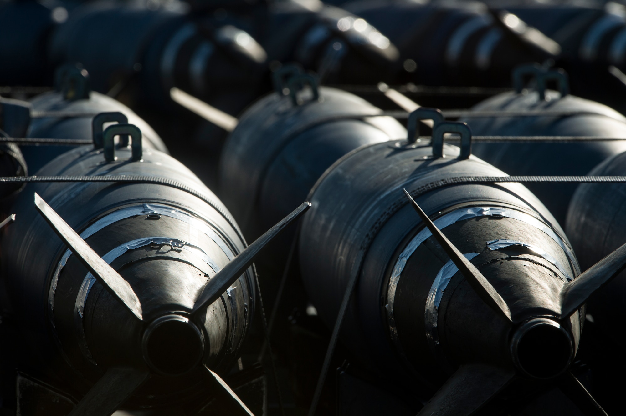 Bomb Drop Unit-50 training explosives are lined up on a transport trailer during a flying training deployment on the flightline at Souda Bay, Greece, Jan. 29, 2016. All missiles, bombs and ammunition used during the training were inert. (U.S. Air Force photo by Staff Sgt. Christopher Ruano/Released)