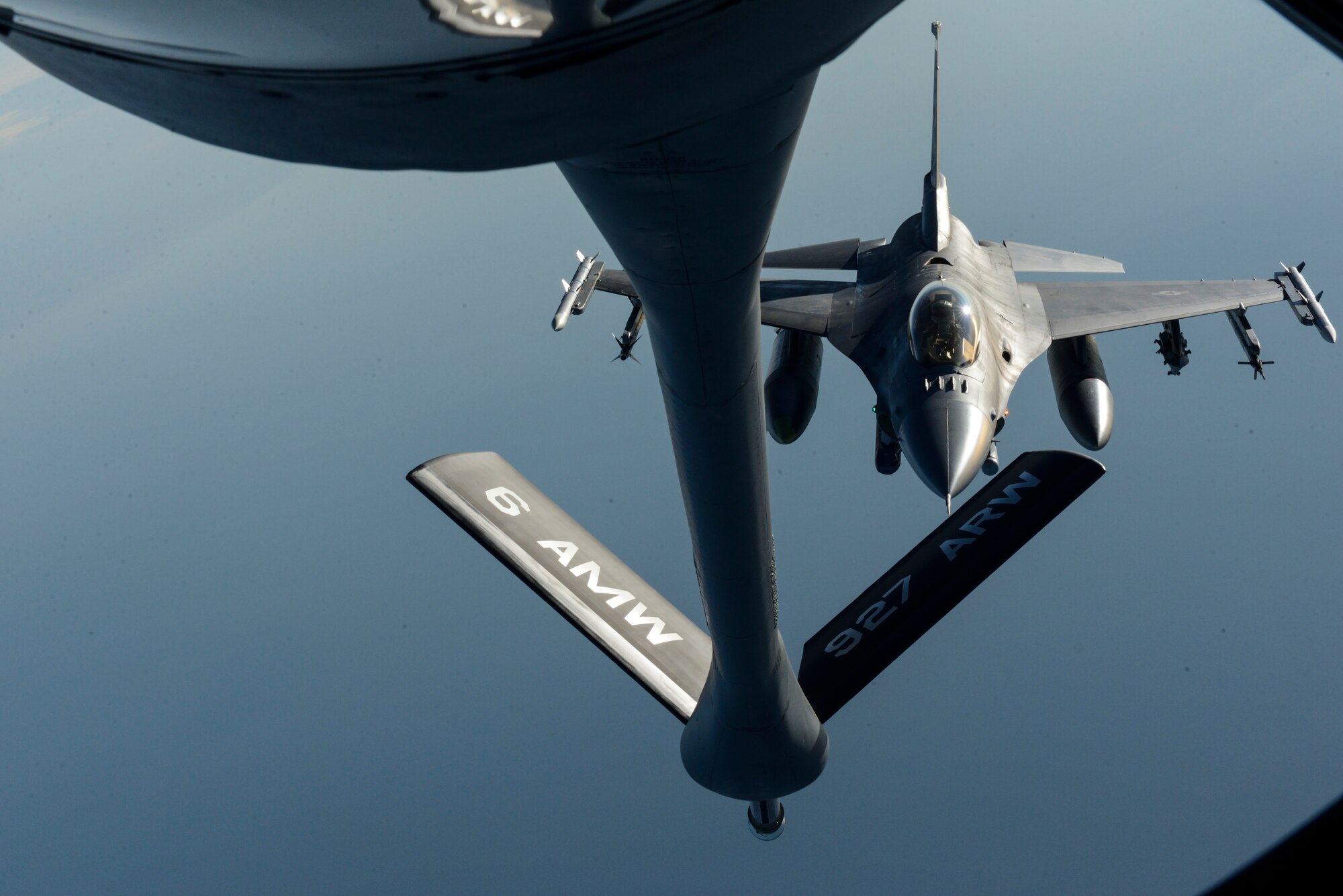 A KC-135 Stratotanker assigned to the 63rd Air Refueling Squadron, 927th Operations Group at MacDill Air Force Base, Fla., refules an F-16 Fighting Falcon fighter aircraft assigned to the 480th Expeditionary Fighter Squadron, during a flying training deployment at Souda Bay, Greece, Feb. 2, 2016. The aircraft conducted the training as part of the bilateral deployment between Greek and U.S. air forces to develop interoperability and cohesion between the partnering nations. (U.S. Air Force photo by Staff Sgt. Christopher Ruano/Released)