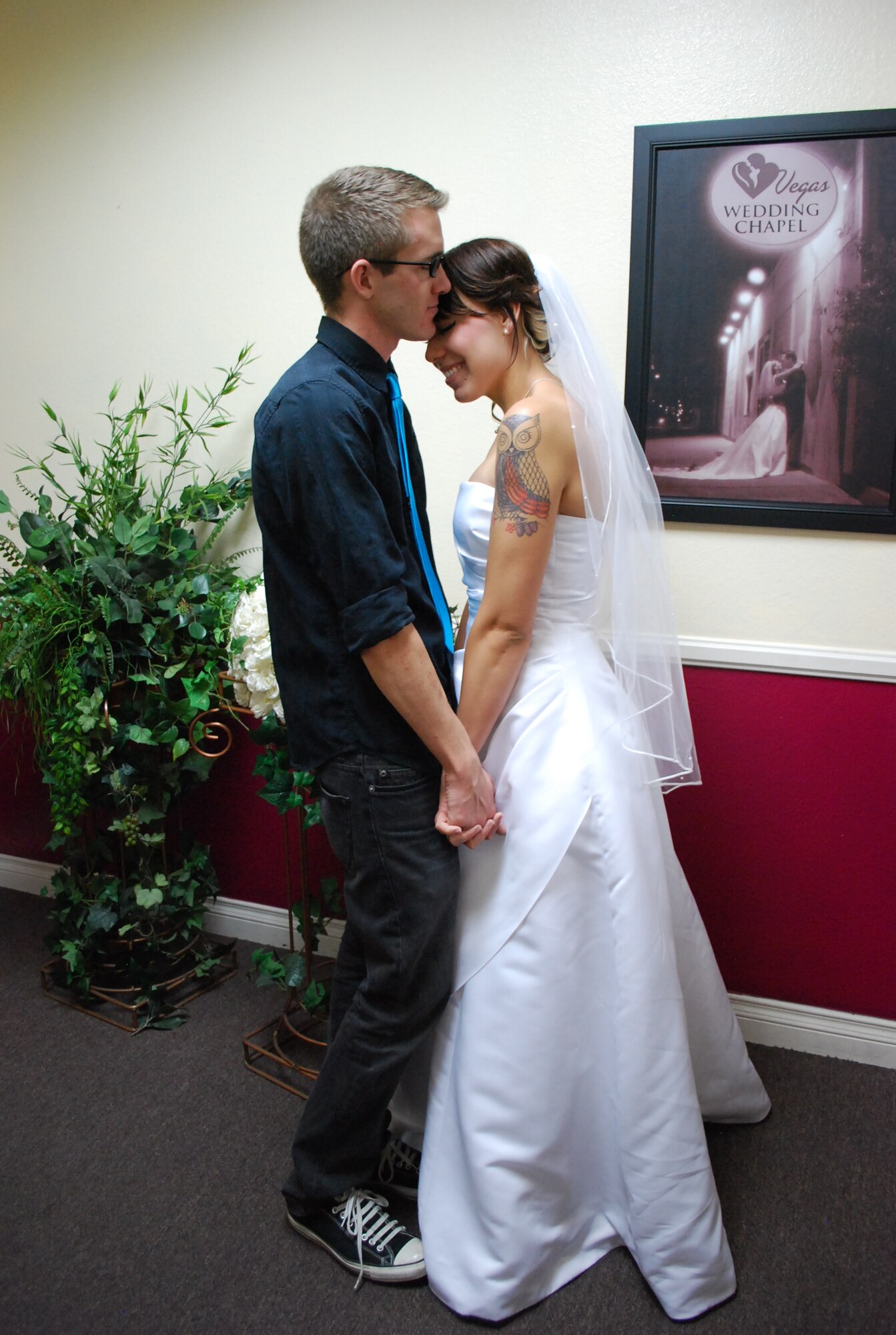 Senior Airman Mitch Rose, 48th Logistics Readiness Squadron customer service technician, and his wife, Erin, eloped in Las Vegas, May 4, 2012. Mitch and Erin married secretly when Mitch came home for two weeks from his first duty station in Germany, and didn’t tell friends or family he was in town till after the ceremony. (Courtesy photo)