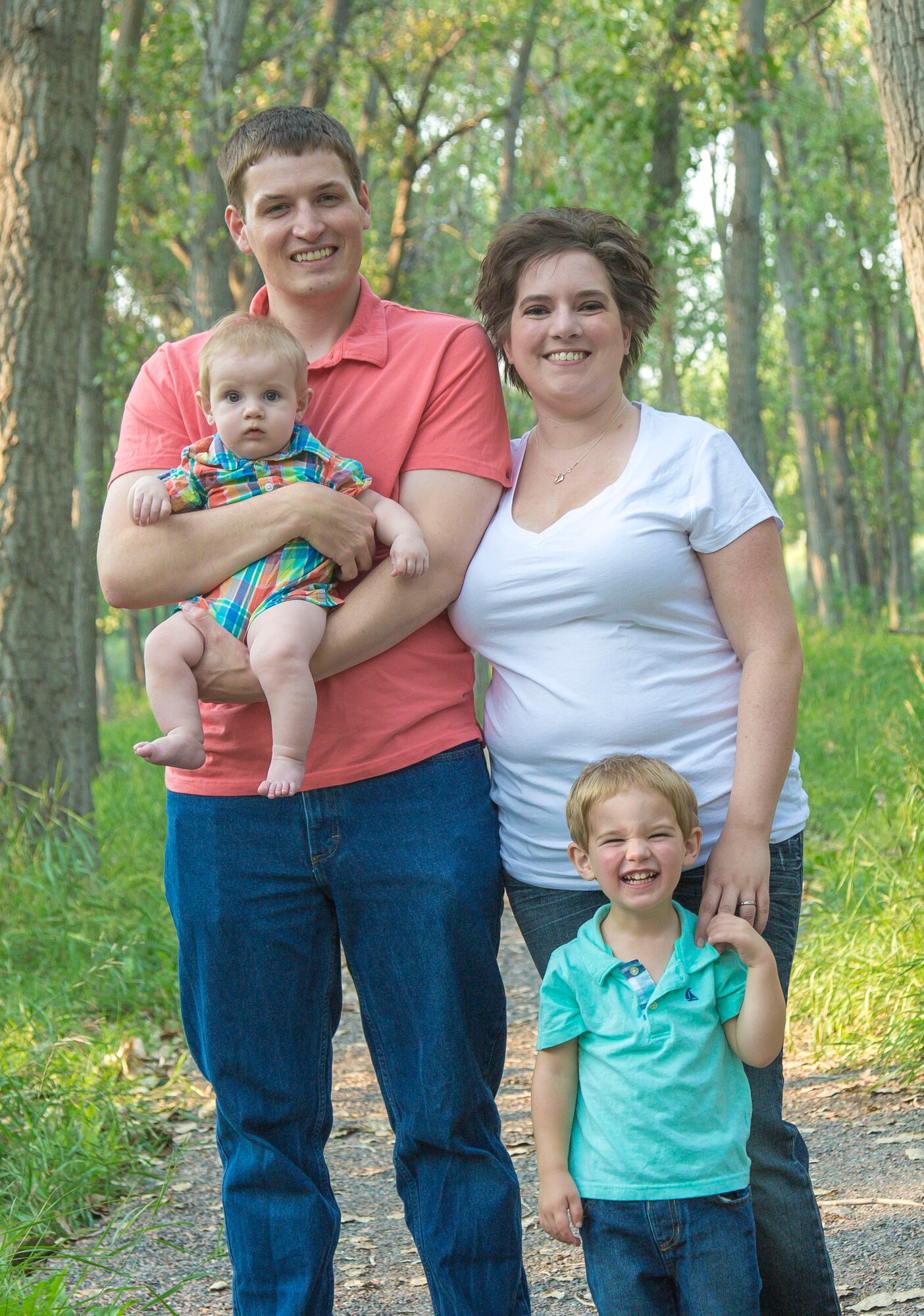Heather Feighner, installation Military Spouse of the Year award recipient, poses for a photo with her family Aug. 20, 2015. The award recognizes spouses who excel at contributing and have an unwavering commitment to the military community and country. (Courtesy photo)