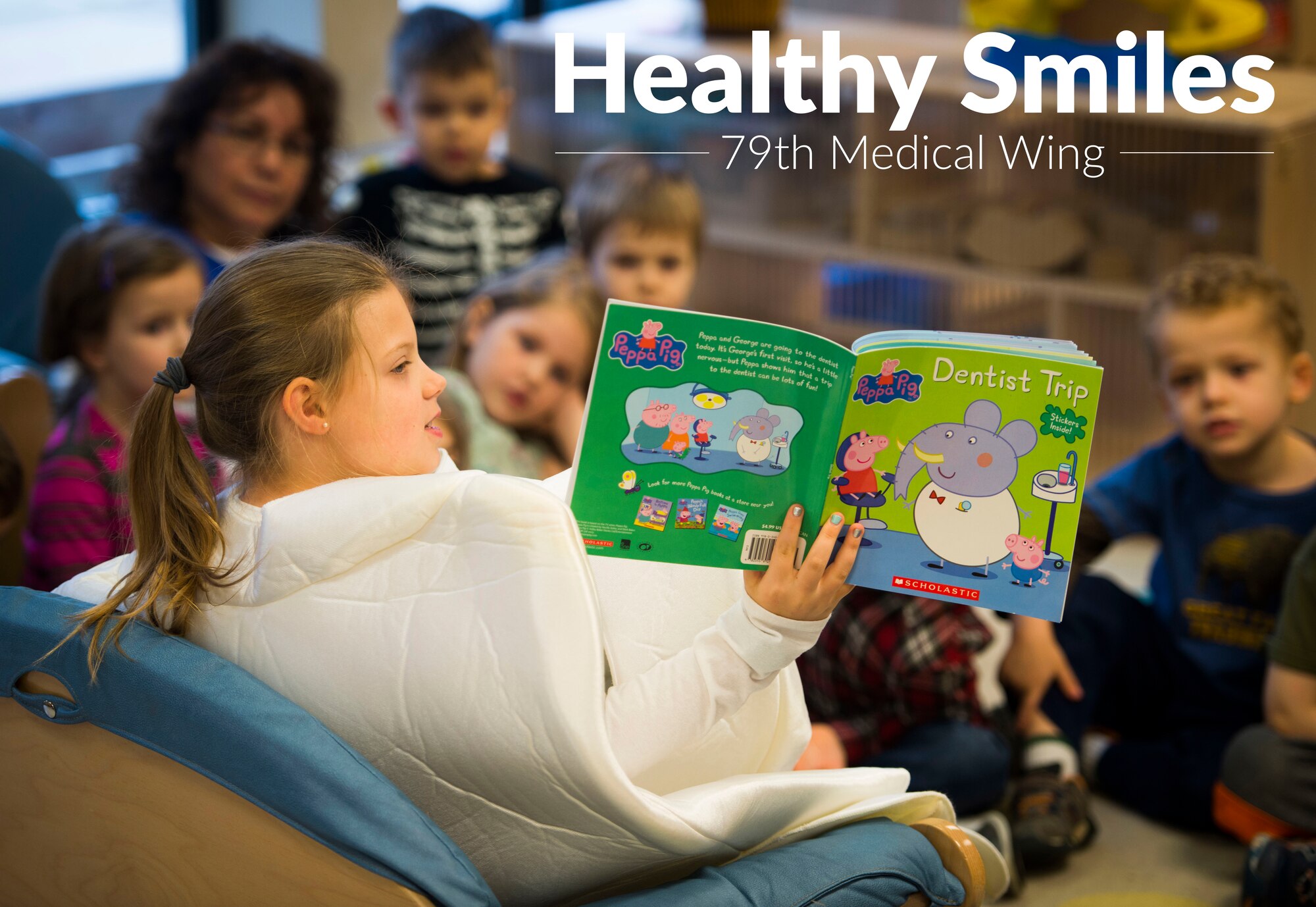 During a National Children's Dental Health Month event at the Child Development Center, members from the 779th Dental Squadron spoke with children about proper brushing techniques, effects of too much sugar and healthy foods. (U.S. Air Force photo by Staff Sgt. Chad C. Strohmeyer/Released)
