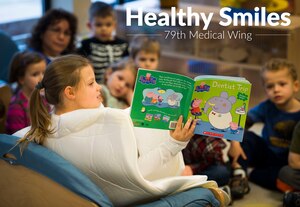 During a National Children's Dental Health Month event at the Child Development Center, members from the 779th Dental Squadron spoke with children about proper brushing techniques, effects of too much sugar and healthy foods. (U.S. Air Force photo by Staff Sgt. Chad C. Strohmeyer/Released)
