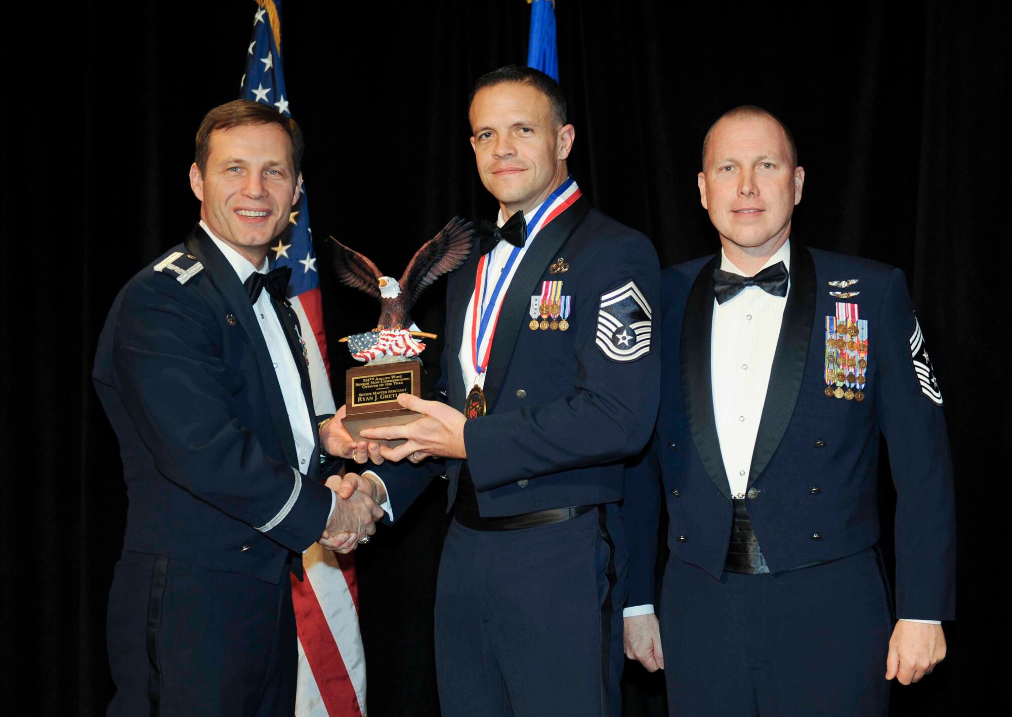 SENIOR NONCOMMISSIONED OFFICER OF THE YEAR Senior Master Sgt. Ryan Gretlein 