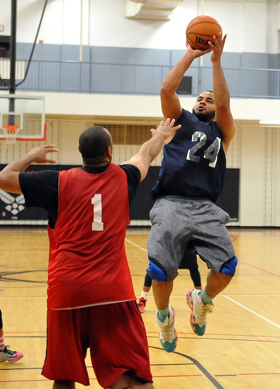 Antoine Lockhart, 402nd Electronics Maintenance Group, shoots a jump shot in the third quarter of an intramural basketball game against the 78th Medical Group Tuesday at the base gym. (U.S. Air Force photo by Tommie Horton)