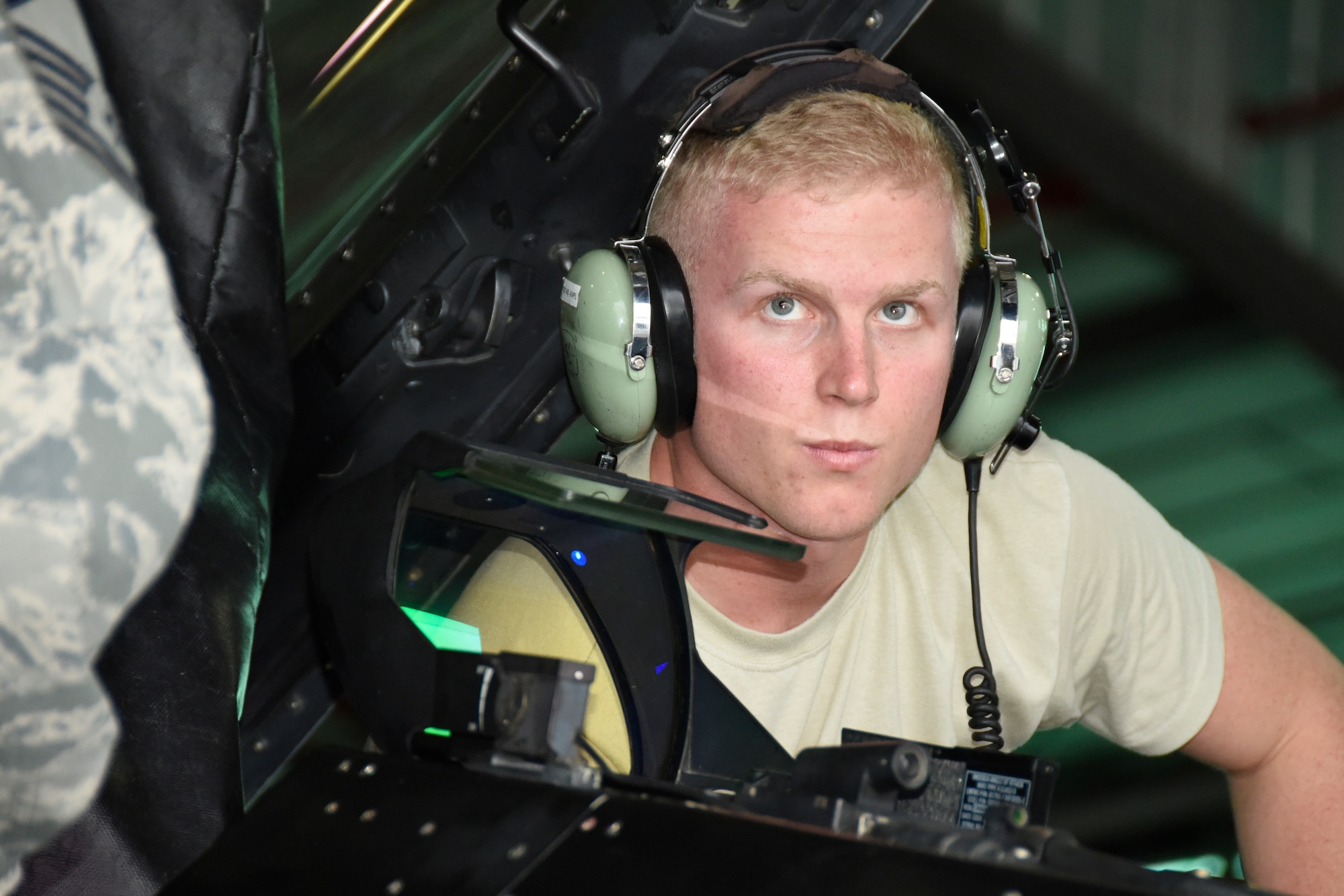 SAVANNAH CRTC, GA - Senior Airman Eric Hunstad, 114th Maintenance Group avioinics technician, listens intently as he works with other team members on an F-16 aircraft during Sentry Savannah 16-1 Feb.3, 2016. The 114th Fighter Wing deployed to Savannah CRTC to participate in the exercise with other Active Duty and Air National Guard units.(U.S. Air National Guard photo by Senior Master Sgt. Nancy Ausland/Released)