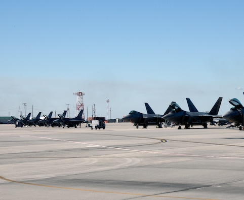 SAVANNAH CRTC, GA -  F-16's from the 114th Fighter Wing, South Dakota Air National Guard sit alongside F-22's from the 43rd Fighter Squadron, Tyndall AFB, Fl. at the Savannah CRTC Feb. 1, 2016.  The unit's participated in Sentry Savannah 16-1 exercise which brought these 4th and 5th generation aircraft together to train.(U.S. Air National Guard photo by Senior Master Sgt. Nancy Ausland/Released)