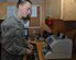Senior Airman Bryan Hersey, a 379th Expeditionary Comptroller Squadron cashier from Lompoc, Calif., counts Qatari Riyal while working inside the cashier cage at Al Udeid Air Base, Qatar, Jan. 24, 2016. One of the most popular services the 379th ECPTS provides is currency exchanges. (U.S. Air Force photo/Tech. Sgt. James Hodgman)