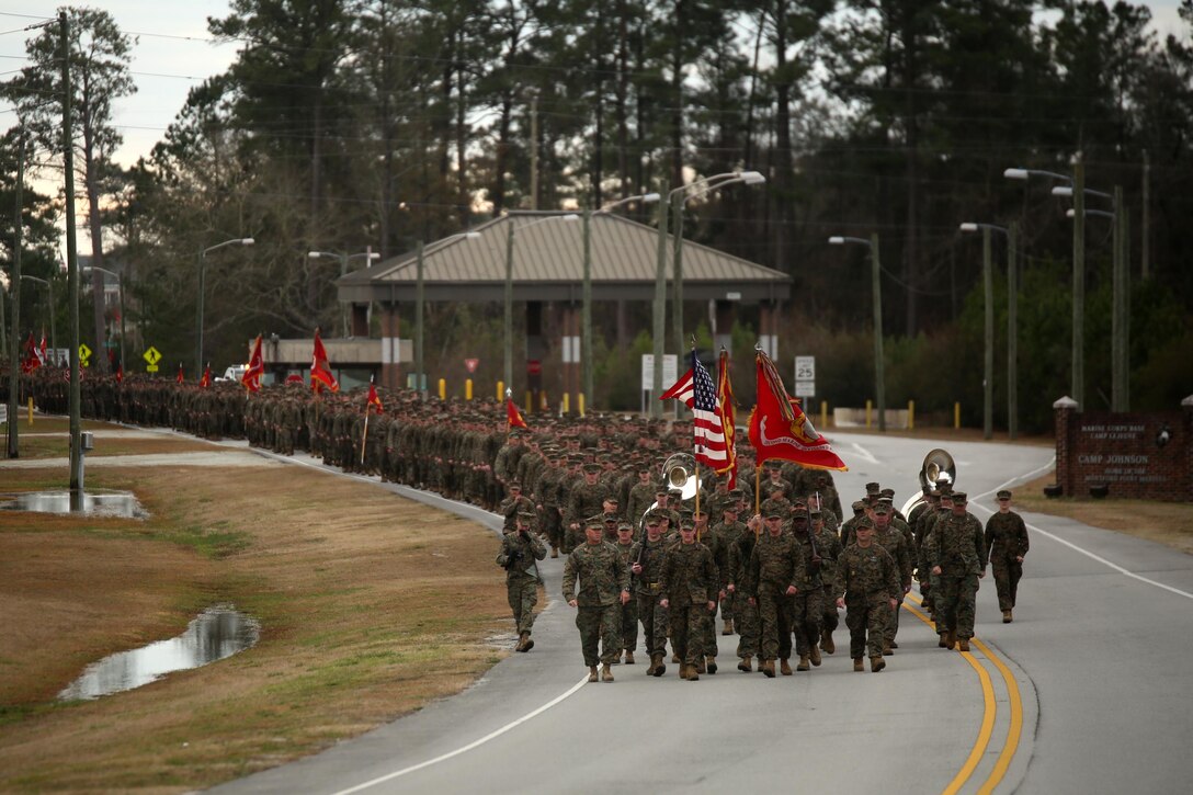 More than 5,000 Marines and sailors with 2nd Marine Division march in the unit’s 75th anniversary parade in downtown Jacksonville, N.C., Feb. 6, 2016. The celebration serves as a time to remember the Marines and sailors who served and continue to serve in 2nd Marine Division, while thanking the local community for their support. (U.S. Marine Corps photo by Cpl. Joey Mendez/Released)