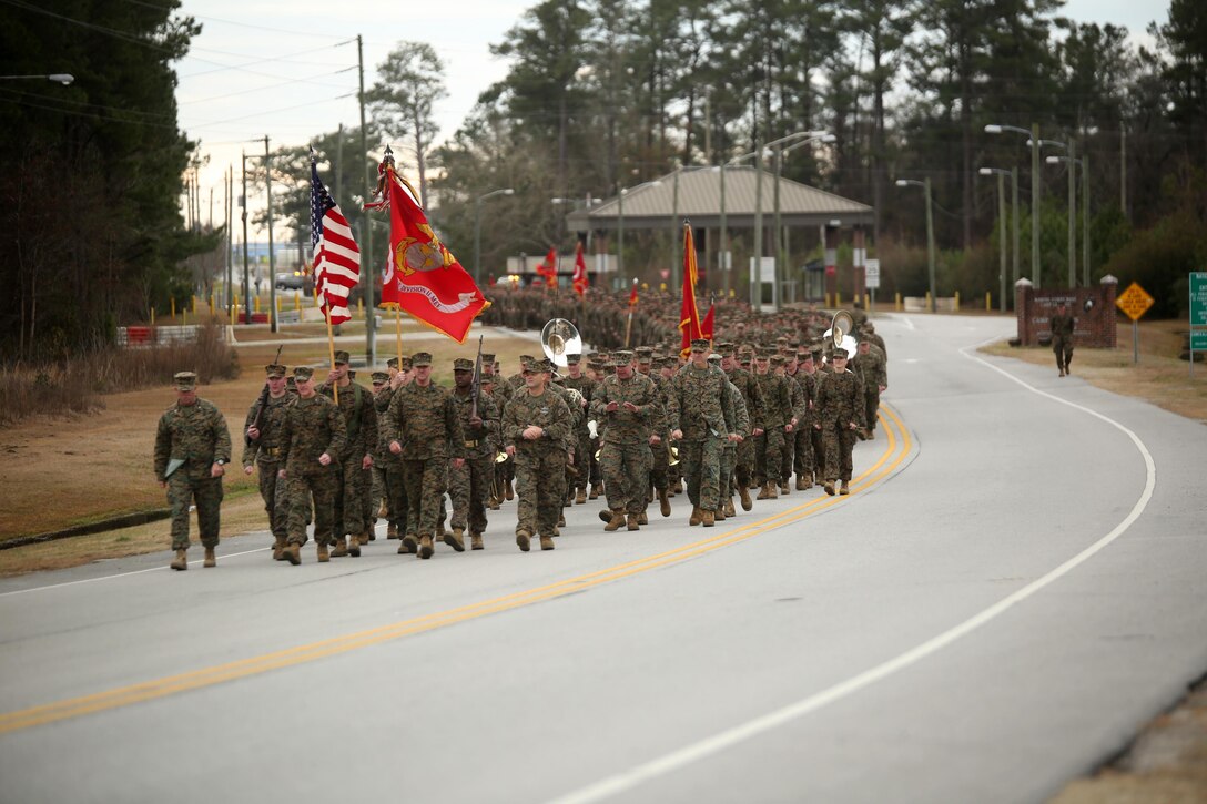 More than 5,000 Marines and sailors with 2nd Marine Division march in the unit’s 75th anniversary parade in downtown Jacksonville, N.C., Feb. 6, 2016. The celebration serves as a time to remember the Marines and sailors who served and continue to serve in 2nd Marine Division, while thanking the local community for their support. (U.S. Marine Corps photo by Cpl. Joey Mendez/Released)