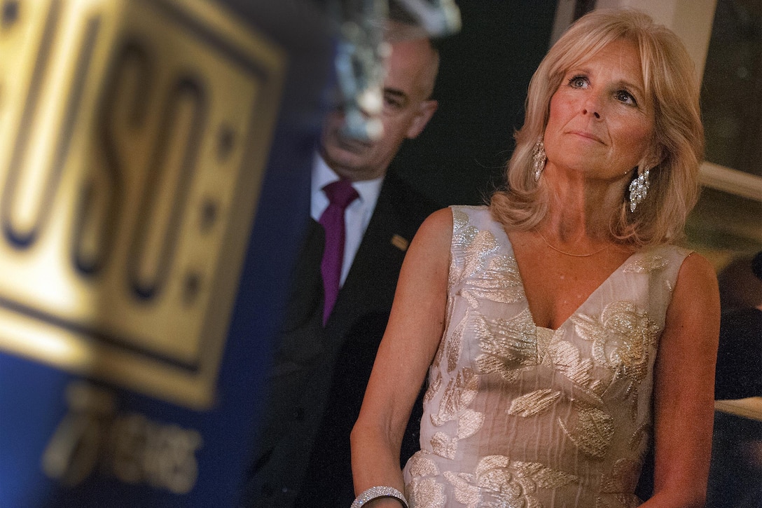 Dr. Jill Biden listens to remarks by Marine Corps Gen. Joseph F. Dunford Jr., chairman of the Joint Chiefs of Staff, at the USO 75th anniversary reception in Washington, D.C., Feb. 4, 2016. DoD photo by Navy Petty Officer 2nd Class Dominique A. Pineiro
