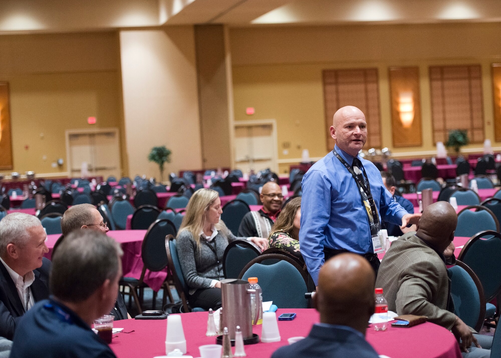 Chief Master Sgt. Carl Hubble, 434th Logistics Readiness Squadron vehicle maintenance superintendent, introduces himself during a Yellow Ribbon reintegration program in Orlando Fla., Dec. 19, 2015. Hubble helped represent Grissom leadership and show support to Grissom Airmen that were afforded an opportunity to attend the event. (U.S. Air Force photo/Staff Sgt. Jami K. Lancette)