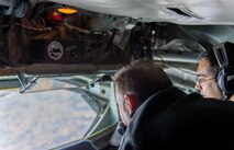 Staff Sgt. Micheal Temal, a boom operator for the 756th Air Refueling Squadron, shows an employer how to operate the KC-135’s air refueling boom during the annual Employer Appreciation Incentive Flight for the 459th Air Refueling Wing, February 6, 2016 on Joint Base Andrews, Md.  The 459th flew nearly 20 employers of reserve service members during the annual event with the help of the National Committee for Employer Support for the Guard and Reserve and the 756th ARS. (U.S. Air Force composite photo/ SSgt. Scott Pauley)