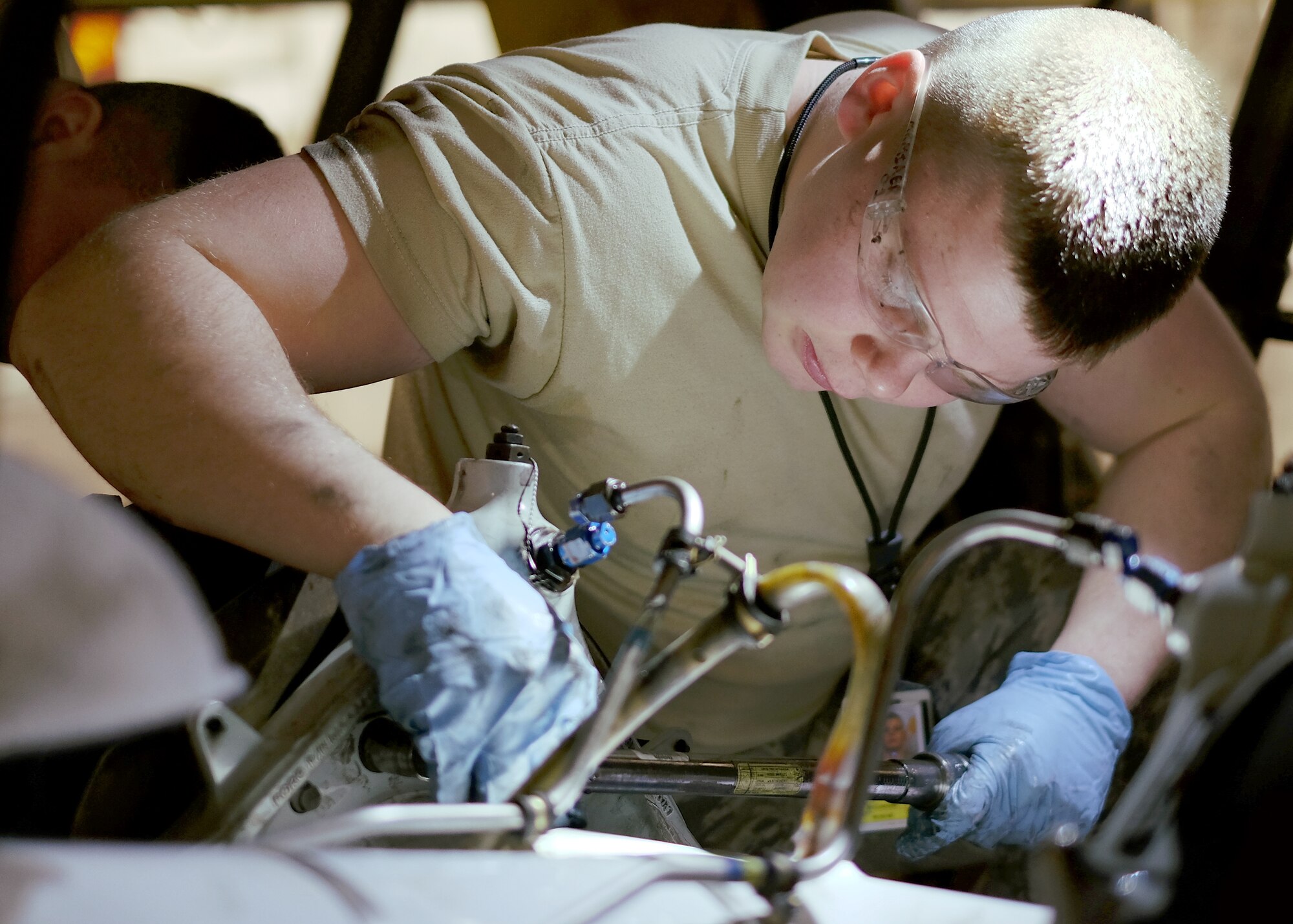 Senior Airman Josh Simmons, 931st  Maintenance Squadron crew chief, works on a KC-135 Stratotanker during a Unit Training Assembly Feb. 7, 2016, at McConnell Air Force Base, Kan. Simmons was able to perform upgrade training throughout the UTA. (U.S. Air Force photo by Senior Airman Preston Webb)