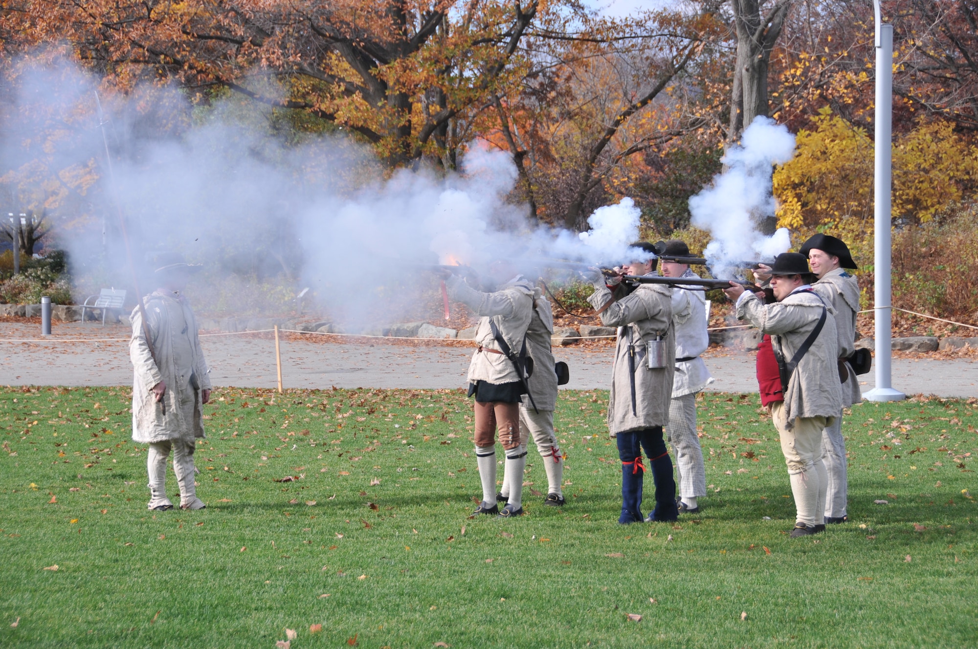 Reenactors from the French & Indian War fire their muskets. The Pennsylvania National Guard joined with the Pennsylvania Department of Conservation of Natural Resources' Point State Park and the Association of the United States Army to organize Steel City Salutes the Troops, Pittsburgh, Nov. 7, 2015. (U.S. Air National Guard Photo by Staff Sgt. Ryan Conley)