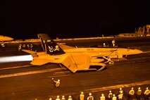 (Dec. 28, 2015) An F/A-18F Super Hornet, assigned to the "Jolly Rogers" of Strike Fighter Squadron (VFA) 103, launches from the flight deck of the aircraft carrier USS Harry S. Truman (CVN 75). The Harry S. Truman Carrier Strike Group is deployed in support of maritime security operations and theater security cooperation efforts in the U.S. 5th Fleet area of operations.