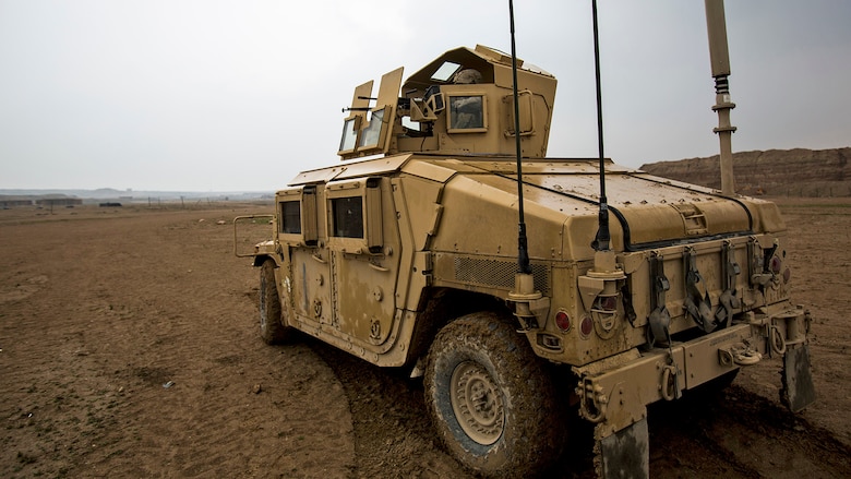 U.S. Marines with Bravo Company, 1st Battalion, 7th Marine Regiment, Special Purpose Marine Air Ground Task Force-Crisis Response-Central Command, conduct a mounted patrol in Al Taqaddum, Iraq, Jan. 1, 2016. U.S. Marines with SPMAGTF-CR-CC are responsible for the force protection of some Combined Joint Task Force – Operation Inherent Resolve bases within the U.S. Central Command area of responsibility.