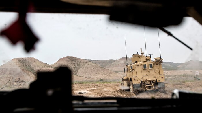 U.S. Marines with Bravo Company, 1st Battalion, 7th Marine Regiment, Special Purpose Marine Air Ground Task Force-Crisis Response-Central Command, conduct a mounted patrol in Al Taqaddum, Iraq, Jan. 1, 2016. U.S. Marines with SPMAGTF-CR-CC are responsible for the force protection of some Combined Joint Task Force – Operation Inherent Resolve bases within the U.S. Central Command area of responsibility.