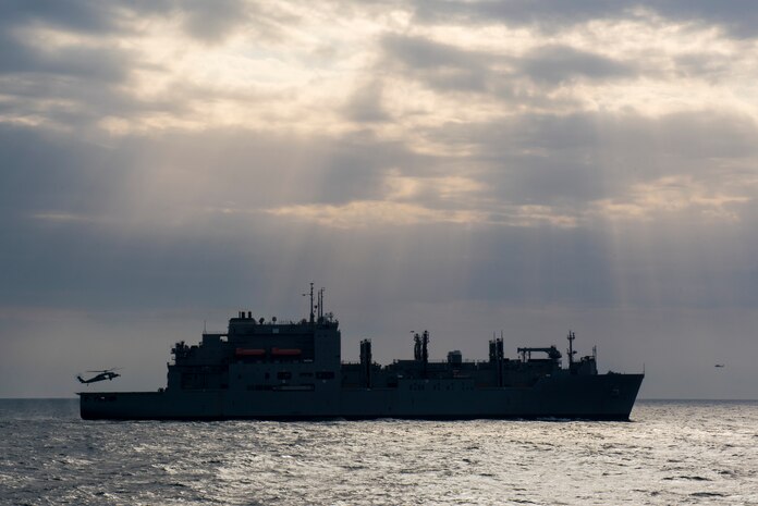 (Feb. 3, 2016) An MH-60S Sea Hawk helicopter, assigned to the "Sea Knights" of Helicopter Sea Combat Squadron (HSC) 22, prepares to land aboard dry cargo and ammunition ship USNS Medgar Evers (T-AKE 13) following a vertical replenishment with aircraft carrier USS Harry S. Truman (CVN 75). Harry S. Truman Carrier Strike Group is deployed in support of Operation Inherent Resolve, maritime security operations, and theater security cooperation efforts in the U.S. 5th Fleet area of operations.