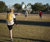 Members of the Air Force Special Operations Air Warfare Center joined 919th Special Operations Wing Airmen in the near freezing temperatures for an ultimate rugby team-building event at Duke Field, Fla., Feb. 5.  (U.S. Air Force photo/Dan Neely)