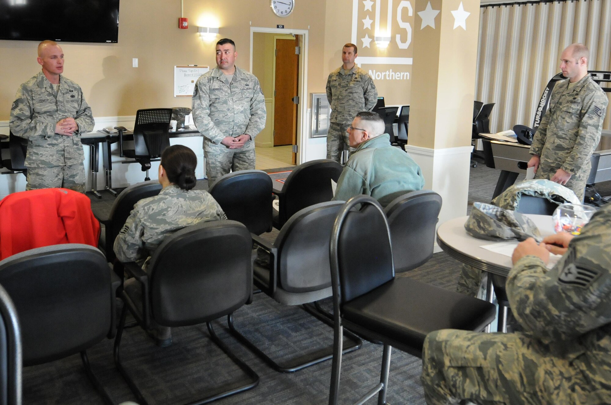 443rd Training Squadron Military Training Instructors (MTIs) Tech. Sgt. Todd Scheff and Master Sgt. Jose Rodriguez give a briefing about the MTI recruitment program to members of the 910th Airlift Wing here Feb. 7, 2016. The purpose of the visit to the 910th by Scheff and Rodriguez is to increase traditional reservist manning for open MTI positions at Basic Military Training, Lackland Air Force Base, Texas. (U.S. Air Force photo/Tech. Sgt. James Brock)