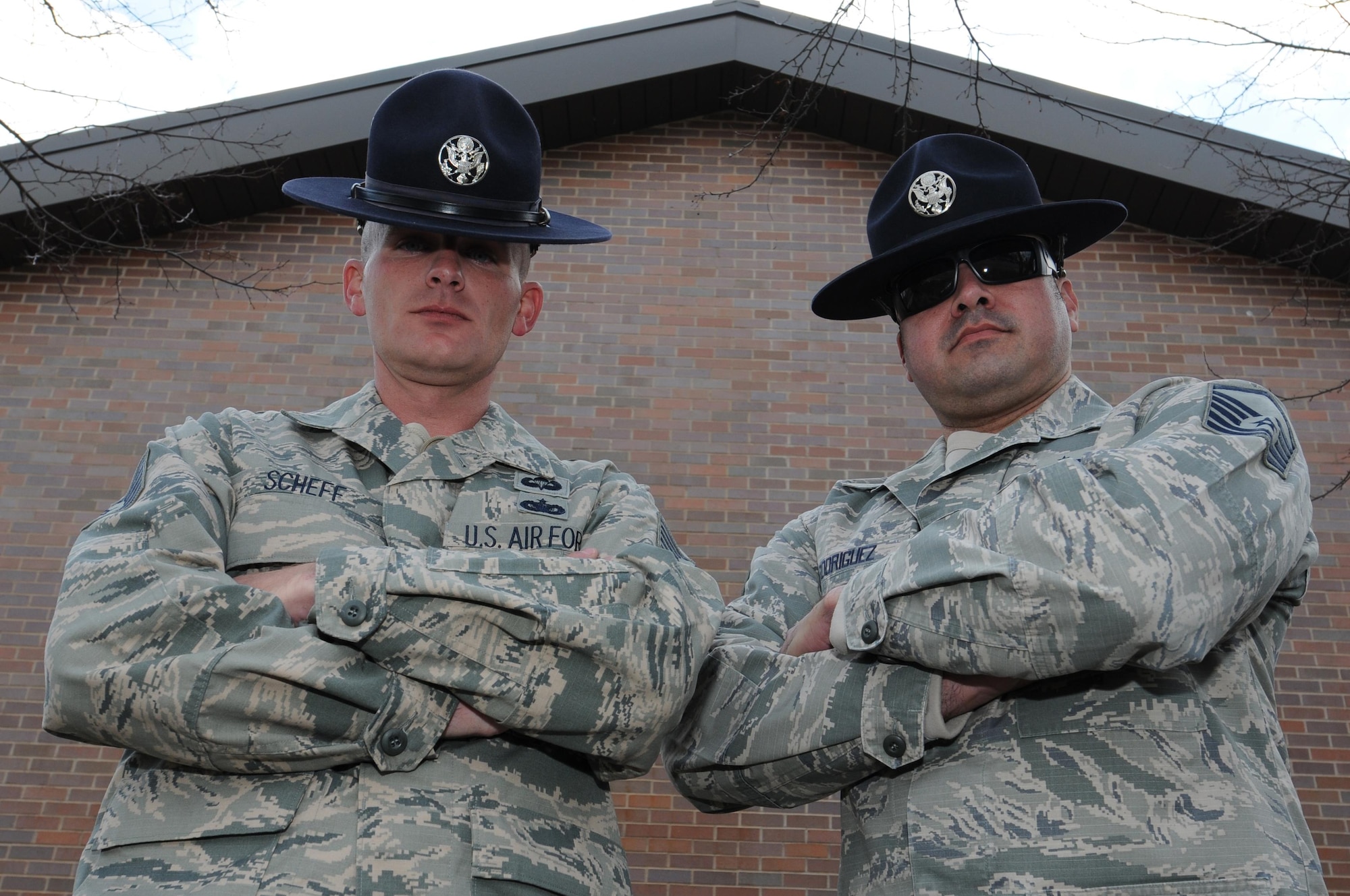 433rd Training Squadron Military Training Instructors (MTIs) Tech. Sgt. Tod Scheff and Master Sgt. Jose Rodriguez stare down the camera for a photo here Feb. 7, 2016. Scheff and Rodriguez visited the 910th Airlift Wing to recruit potential Air Force Reserve MTIs for Basic Military Instruction at Lackland Air Force Base, Texas. (U.S. Air Force photo/Tech. Sgt. James Brock)