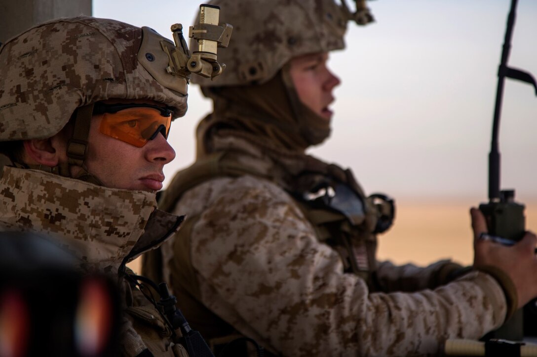 U.S. Marine Corps Capt. William Brown, foward air controller, with 1st Air Naval Gunfire Liason Company, Special Purpose Marine Air-Ground Task Force-Crisis Response-Central Command (SPMAGTF-CR-CC), observes simulated targets during exercise Eager Centaur in an undisclosed location, Southwest Asia, Feb. 1, 2016. Eager Centaur is conducted to complete initial joint terminal attack controller training and exercise the MAGTF Fire Support Coordination Center, to include combined arms live fire tactics, techniques and procedures. (U.S. Marine Corps photo by Cpl. Akeel Austin/Released)