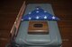 Military Working Dog Kitty’s folded flag and memorabilia sit atop her kennel awaiting her memorial service at Minot Air Force Base, N.D., Feb. 2, 2016. Kitty had been retired for a month when she died of an illness. (U.S. Air Force photo/Airman 1st Class Christian Sullivan)