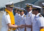 SATTAHIP, Thailand (Feb. 5, 2016) - Cmdr. Daniel P. Duhan, left, commanding officer of amphibious dock landing ship USS Ashland (LSD 48), greets members of the Royal Thailand Navy following the ship's arrival for exercise Cobra Gold. A Thai-U.S. co-sponsored multinational joint exercise, Cobra Gold is designed to advance regional security by exercising a robust multinational force from nations sharing common goals and security commitments in the Indo-Asia-Pacific. 