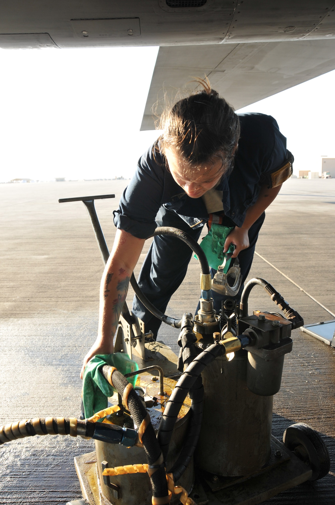 Senior Airman Alexis Anderson, 379th Expeditionary Aircraft Maintenance Squadron crew chief, performs a post-flight inspection on a B-1 B Lancer, Jan. 11, at Al Udeid Air Base, Qatar. After a B-1 mission is complete, Anderson and other maintainers, perform several post flight inspections to ensure the aircraft is mission ready. Anderson is deployed from the 307th Expeditionary Aircraft Maintenance Unit at Ellsworth Air Force Base, South Dakota. (U.S. Air Force photo by Tech. Sgt. Terrica Y. Jones/Released)