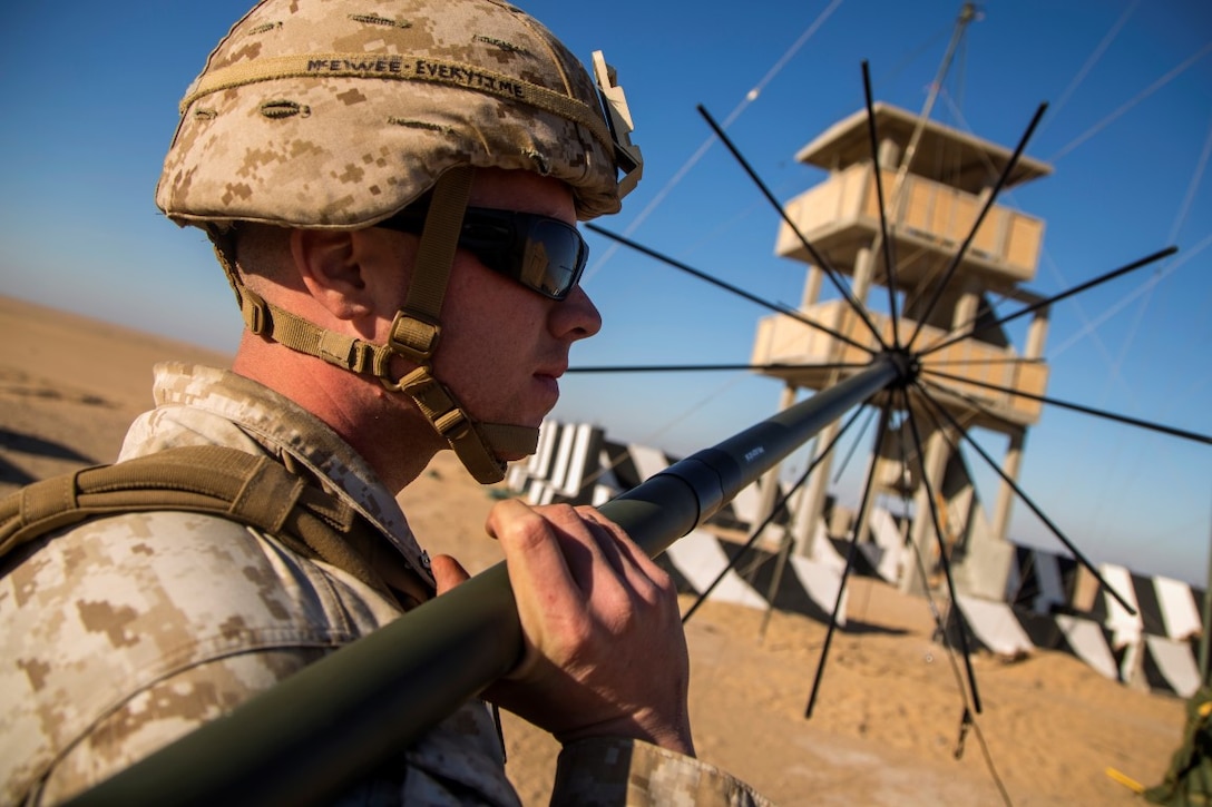 U.S.Marine Corps Cpl. Teran McElwee, radio operator,Special Purpose Marine Air Ground Task Force  Crisis Response Central Command (SPMAGTF-CR-CC) prepares to set up a ultra high frequency antena during exercise Eager Centaur in an undisclosed location, Southwest Asia, Feb. 1, 2016. Eager Centaur is conducted to complete initial joint terminal attack controller training and exercise the MAGTF Fire Support Coordination Center, to include combined arms live fire tactics, techniques and procedures. (U.S. Marine Corps photo by Cpl. Akeel Austin/Released)