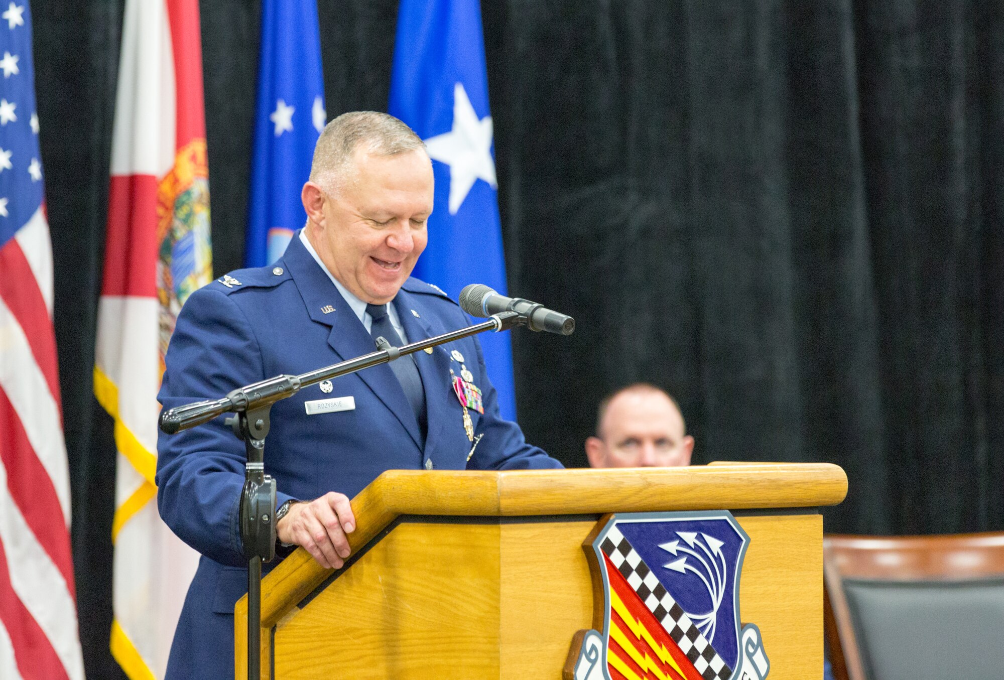 Col. Elwin A. Rozyskie, the 482nd Mission Support Group commander, speaks during his retirement ceremony at the Sam Johnson Fitness Center at Homestead Air Reserve Base, Fla., Feb. 7. Rozyskie is retiring after more than 40 years of service. (U.S. Air Force photo/Tech. Sgt. Lionel Castellano)