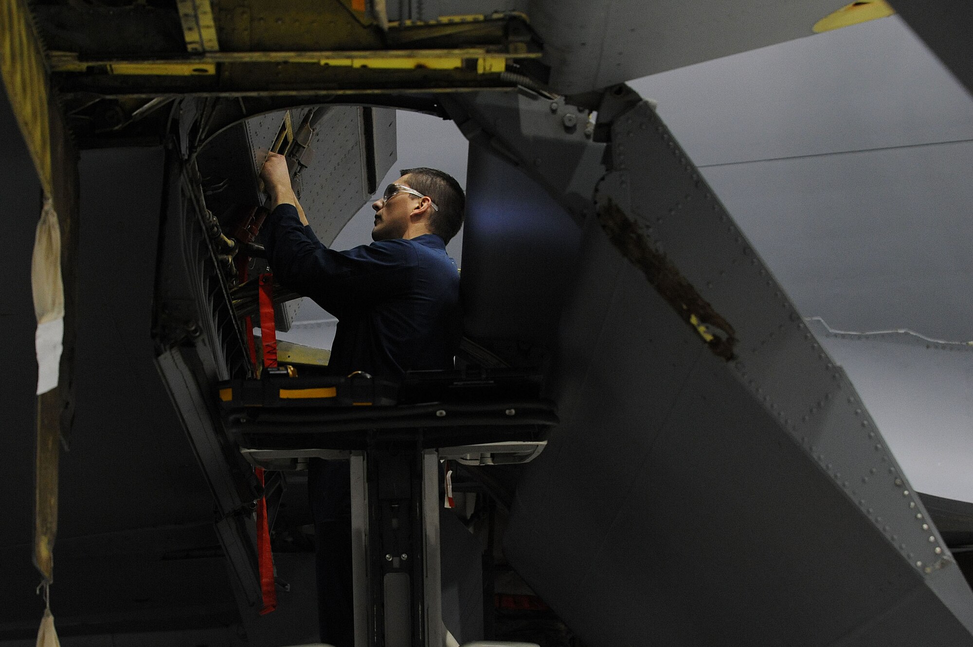 Staff Sgt. Trevor Mandrigues, 22nd Maintenance Squadron aerospace maintenance craftsman, inspects the hydraulic line for cracks on a KC-135 Stratotanker, Feb. 1, 2016, at McConnell Air Force Base, Kan. Maintenance Airmen periodically inspect the aircraft against mechanical issues to guarantee the fleet is ready for aerial refueling mission at all times. (U.S. Air Force photo/Airman Jenna K. Caldwell)  