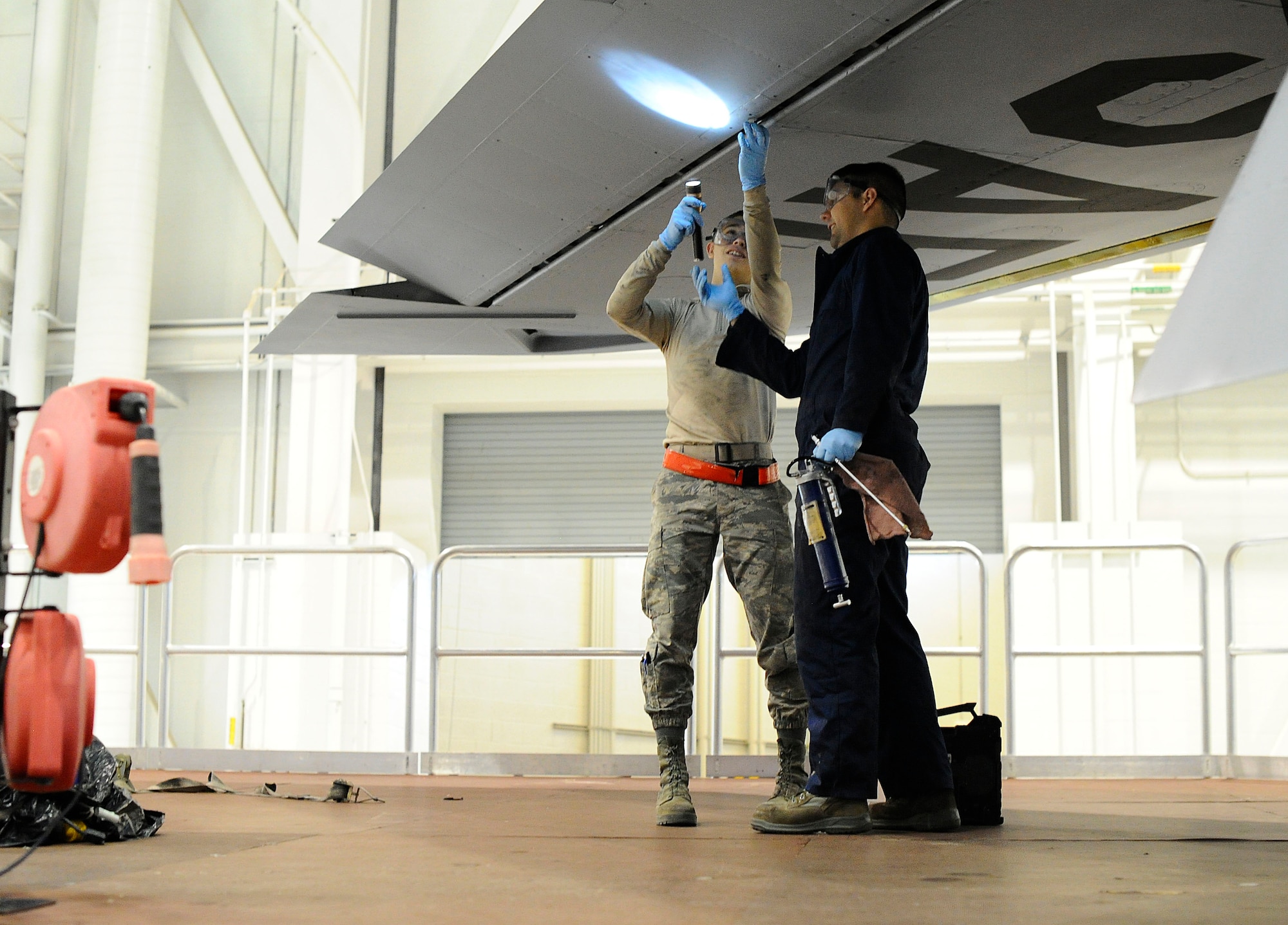 Maintenance Airmen inspect a KC-135 Stratotanker, Feb. 2, 2016, at McConnell Air Force Base, Kan. Maintenance Airmen perform scheduled inspections to check for any repairs the aircraft may require before it becomes a more extensive problem that could hinder the aerial refueling mission. (U.S. Air Force photo/Airman Jenna K. Caldwell)  