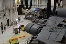 Maintenance Airmen from multiple squadrons on base work together to perform a periodic inspection on a KC-135 Stratotanker, Feb. 2, 2016, at McConnell Air Force Base, Kan. Each Airman performs a specific role during the aircraft inspection which contributes to the team completing the mission as a whole.  (U.S. Air Force photo/Airman Jenna K. Caldwell)  