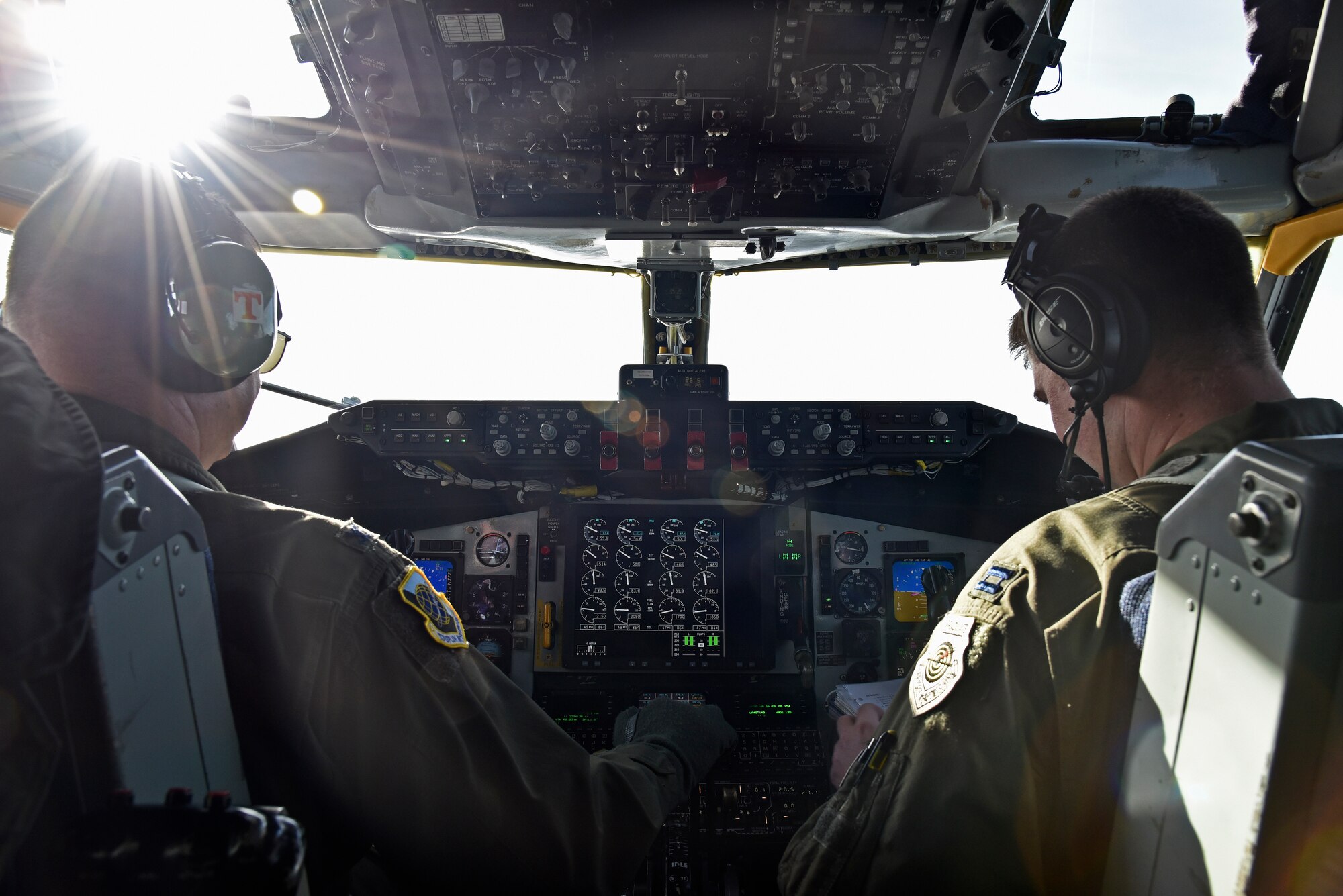 Col. Brian McDaniel, 92nd Air Refueling Wing commander, goes through a flying checklist with Capt. Timothy McBride, 93rd Air Refueling Squadron Block 45 training program manager, during a local training flight Feb. 4, 2016, over Washington State. It was McDaniel’s first time flying the KC-135 Stratotanker with its newest upgrade, the Block 45. (U.S. Air Force photo/Airman 1st Class Mackenzie Richardson)