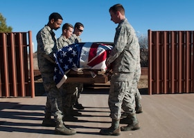 Dyess honor guardsmen practice a pall-bearing sequence Feb. 2, 2016 at Dyess Air Force Base, Texas. The honor guard moves to the hearse in a formation, removes the casket and transfers the casket to the burial site during this sequence using facing movements and commands.  (U.S. Air Force photo by Airman First Class Katherine Miller/Released)