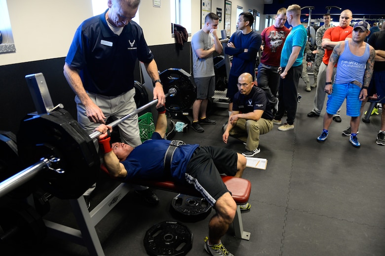 Rodrigo Ocampo, 4th Space Operations Squadron, lifts 235 pounds during the bench press portion of the bench press and deadlift competition held in the fitness center at Schriever Air Force Base, Colorado, Friday, Jan. 29, 2016. Ocampo finished first overall in the male category with a bench press of 235 pounds and a deadlift of 400 pounds, a combined 460 percent of his body weight.  (U.S. Air Force photo/Christopher DeWitt)