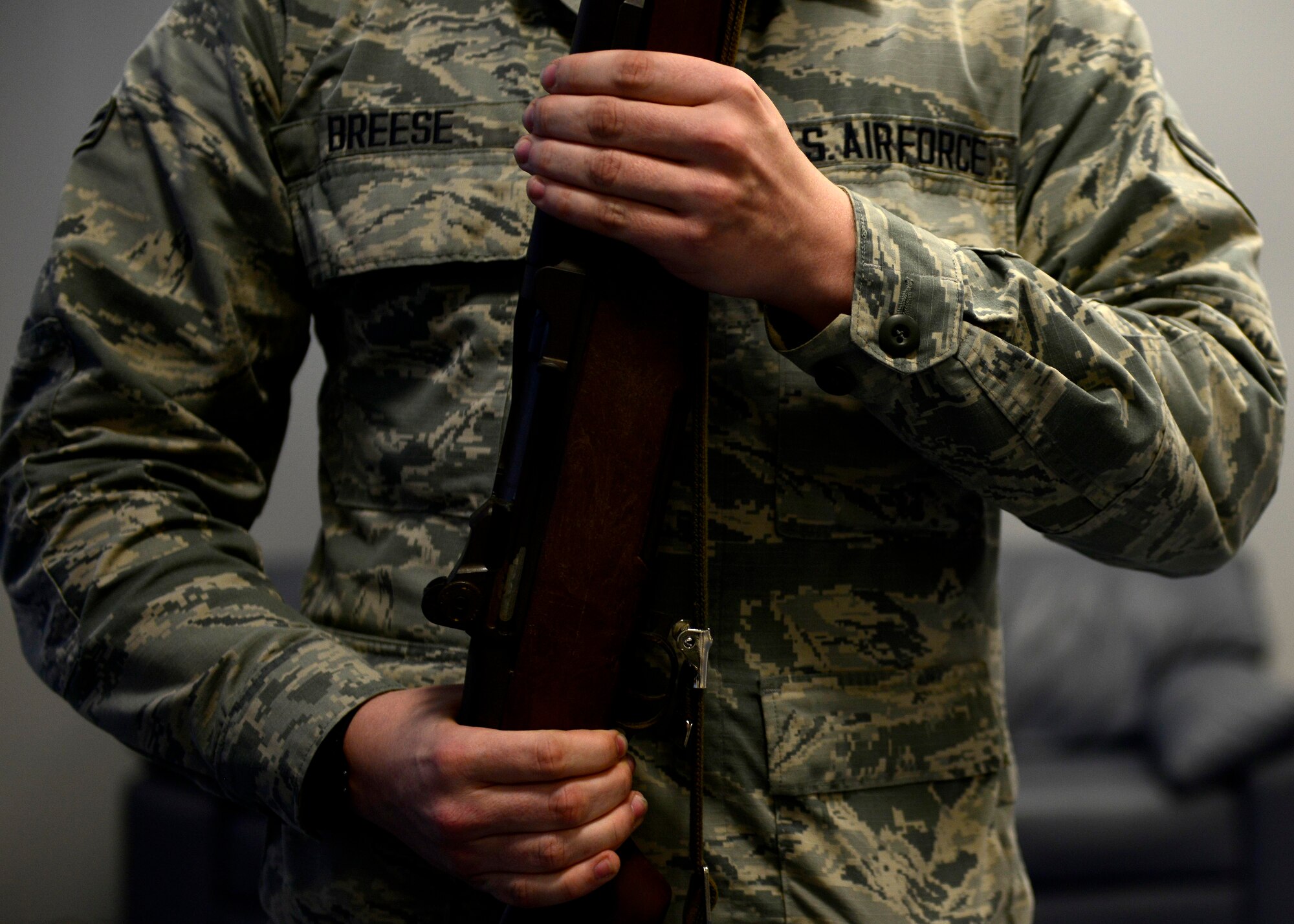 U.S. Air Force Airman 1st Class Dylan Breese, Aviano Air Base honor guardsman, prepares to present the colors during practice, Feb. 1, 2016, at Aviano Air Base, Italy. Honor guard members here provide a variety of services to the base and local community, including presenting and posting of the colors, folding retirement flags and POW/MIA table ceremonies. (U.S. Air Force photo by Senior Airman Areca T. Bell/Released)