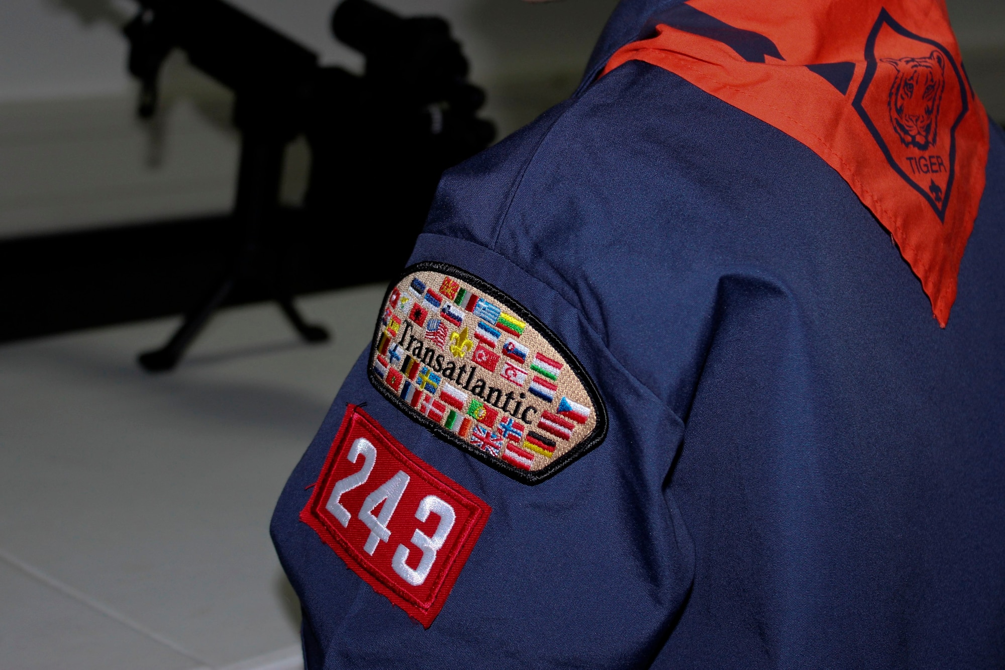 A Cub Scout District Transatlantic patch and Cub Scout Pack 243 patch are sewn onto a Tiger Cub uniform Feb. 3, 2016, Ramstein Air Base, Germany. Airmen from the 86th SFS gave local Cub Scouts a tour of their facilities and taught them what they do as first responders. (U.S. Air Force photo/Tech. Sgt. Robert A. Webb) 