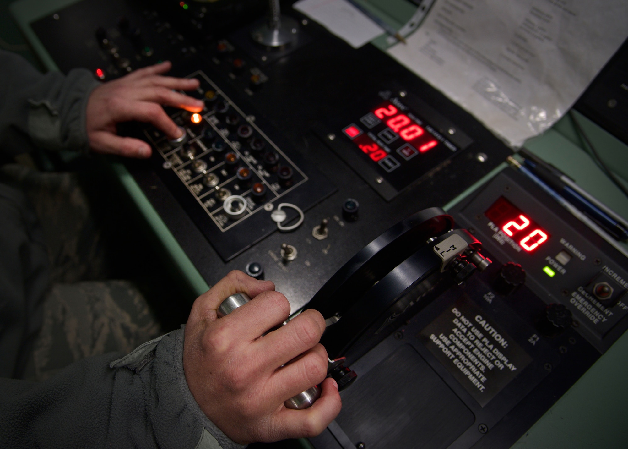 U.S. Air Force Staff Sgt. Brittney Rogerson, an aerospace propulsion craftsman with the 35th Maintenance Squadron, increases the thrust of an F10-GE-129 engine during a routine engine test at Misawa Air Base, Japan, Feb. 4, 2016. Propulsion Airmen monitor and control the engine test in a portable testing cab. During the test, the cab measures the engine’s parameters, speed, temperatures and vibrations. Rogerson hails from York, Pennsylvania. (U.S. Air Force photo by Senior Airman Deana Heitzman)