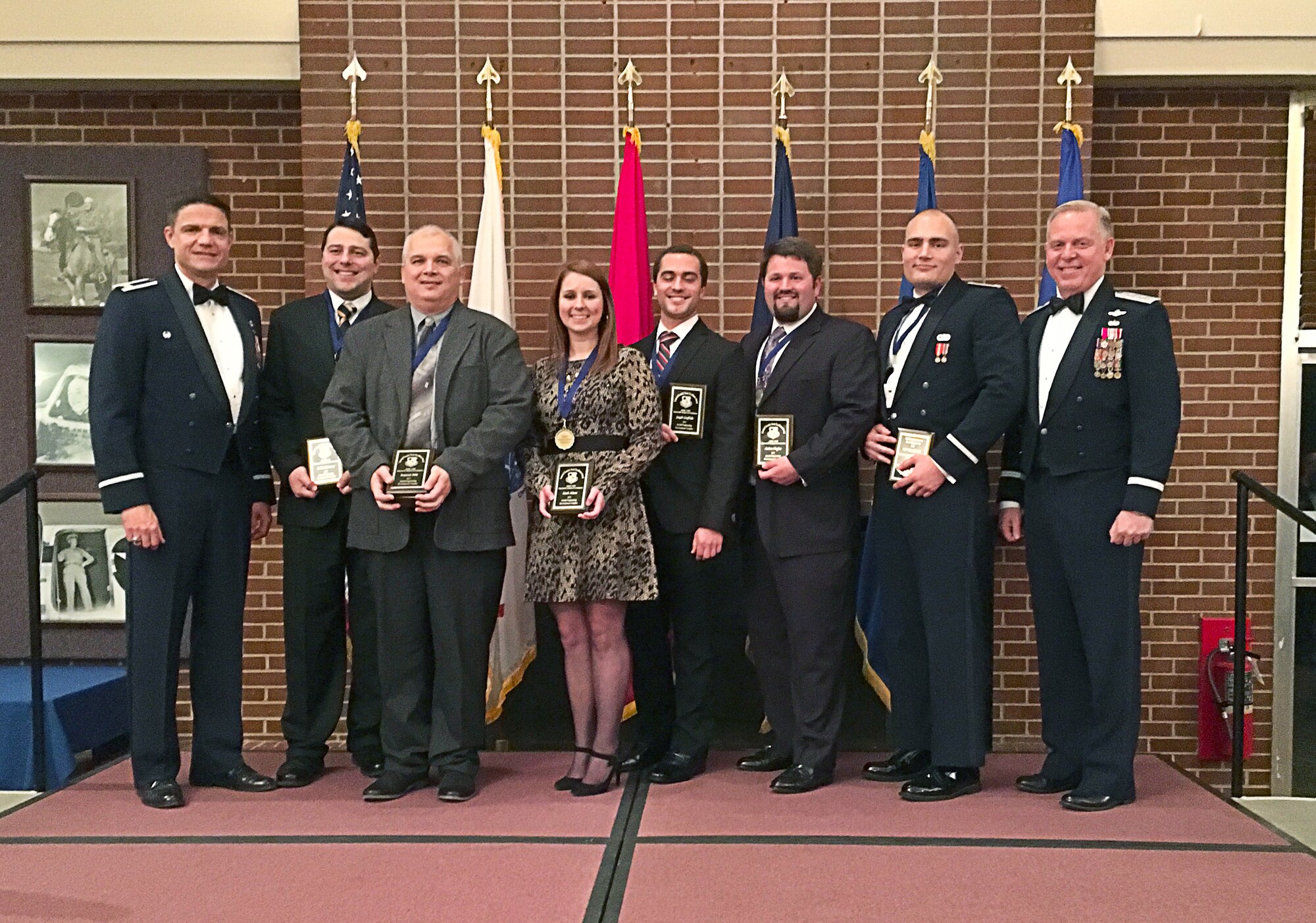 During the AEDC Annual Award Banquet Jan. 29 at the Arnold Lakeside Center, the AEDC von Kármán Gas Dynamics Facility Hypersonic Analysis and Evaluation Team received the General Lee Gossick Team Excellence Recognition. Team members, pictured with AEDC Commander Col. Rodney Todaro (far left) and Maj. Gen. David A. Harris, commander of the Air Force Test Center (far right), are: (l-r) Calain Schuman, Ben Mills, Sarah Adams, Joe Giuffrida, Andrew Hughes and 1st Lt. Kyle Monsma. Team members not present were: Christopher Chinske, Edwards AFB; John Hopf, Rebecca Rought and Joshua Webb. (Courtesy Photo)